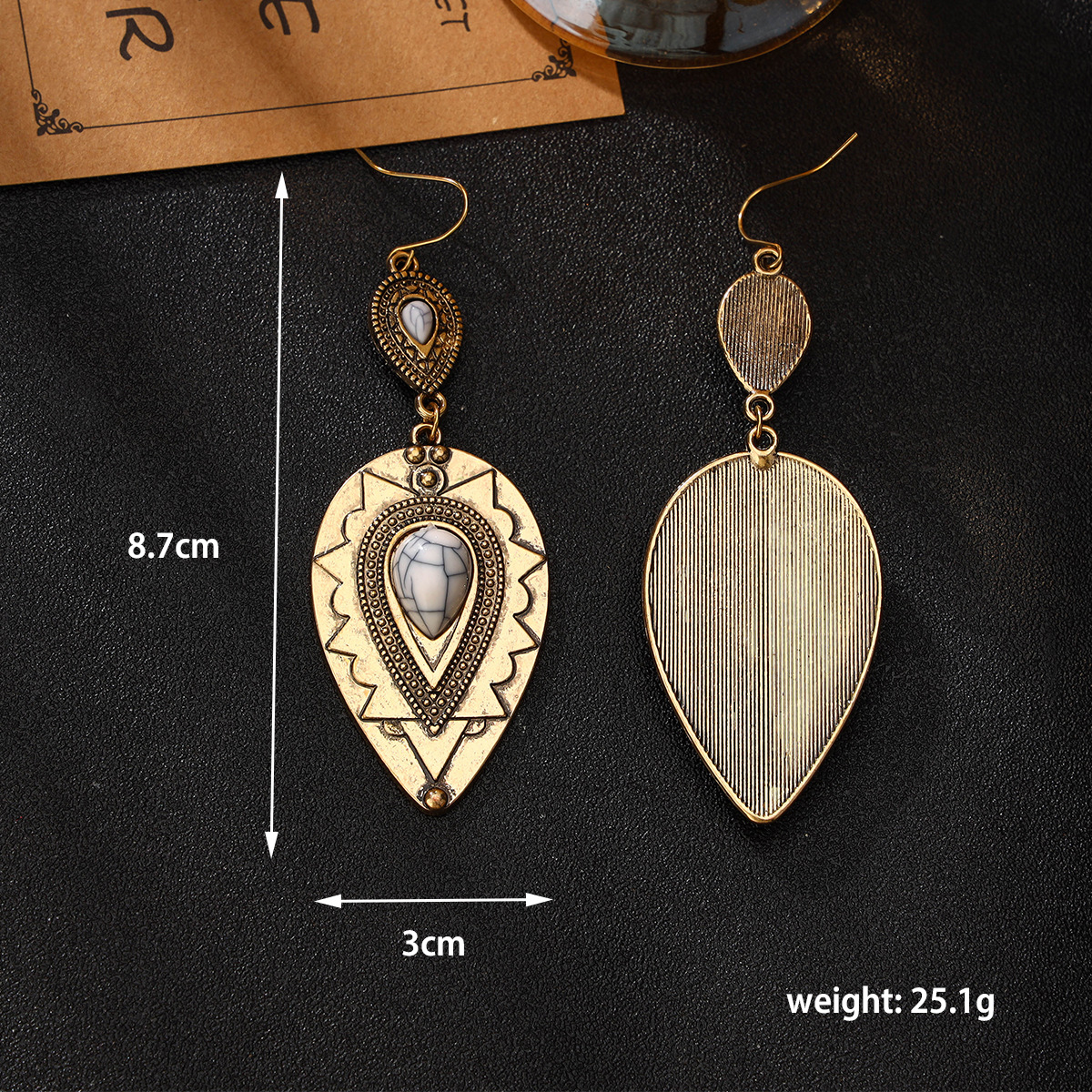 2024 New Europe And The United States Personality Retro Earrings Fashion Design Water Drop Earrings Carved Embedded White Beads Earrings Manufacturers Application Scenario