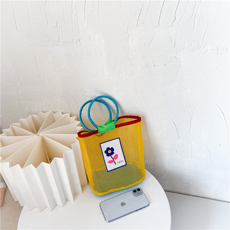 Children's 2025 Spring/Summer new handbag, a versatile two-color shopping bag for girls, a cute baby, a trendy bag for beach outings Application Scenario