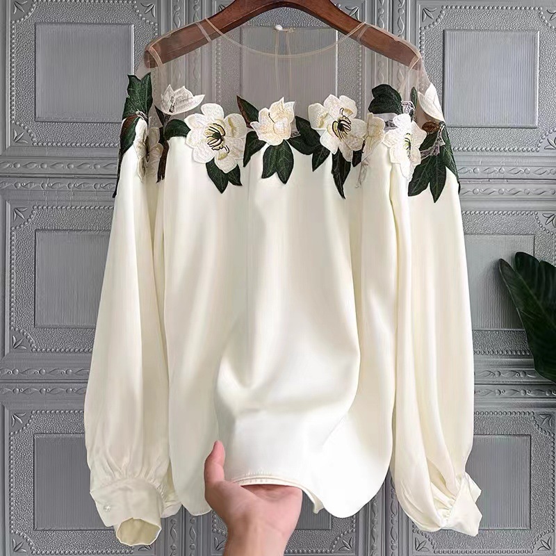 This is a fashionable long-sleeved, elegant and drape shirt with a unique lace-stitched embroidered collar for women in the autumn of 2022