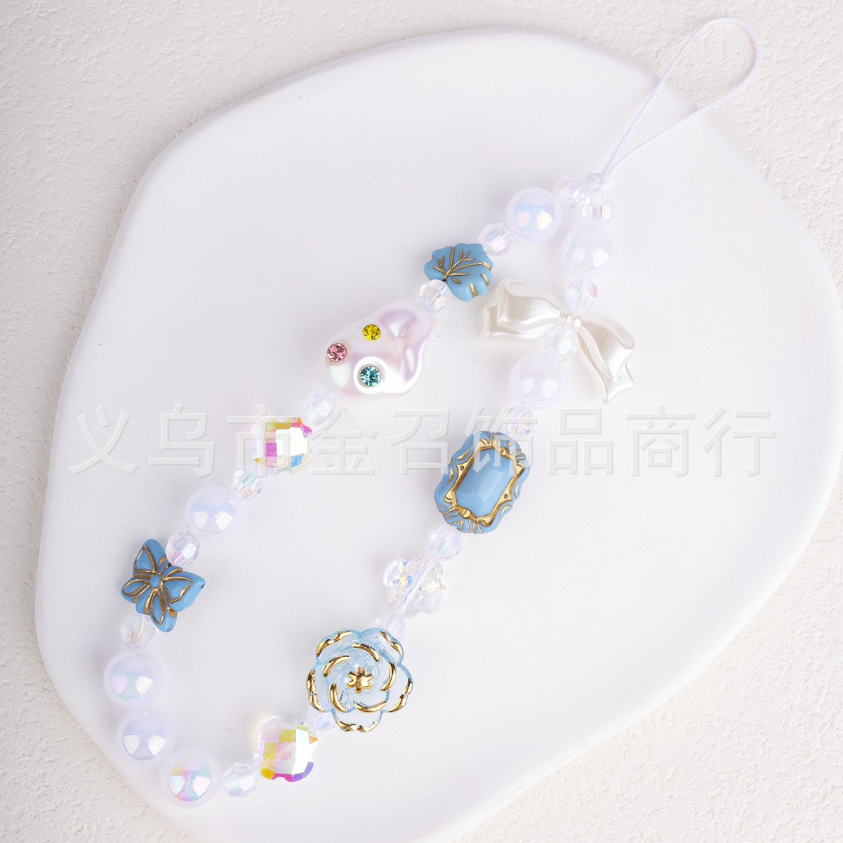 New summer fresh and sweet fairy mobile phone chain with diamonds, pearls, flowers and butterflies as a mobile phone pendant Application Scenario