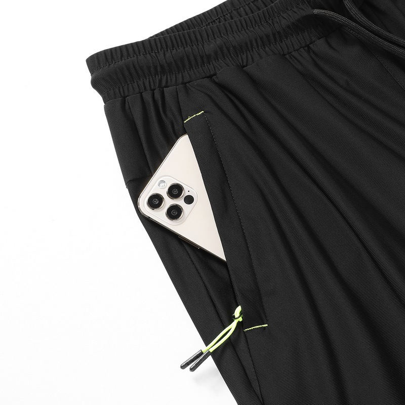 Verano 2022 nuevos pantalones casuales para hombres hielo seda transpirable suelto ligero elástico rápido seco nueve tallas pantalones para hombres tallas grandes Specification image