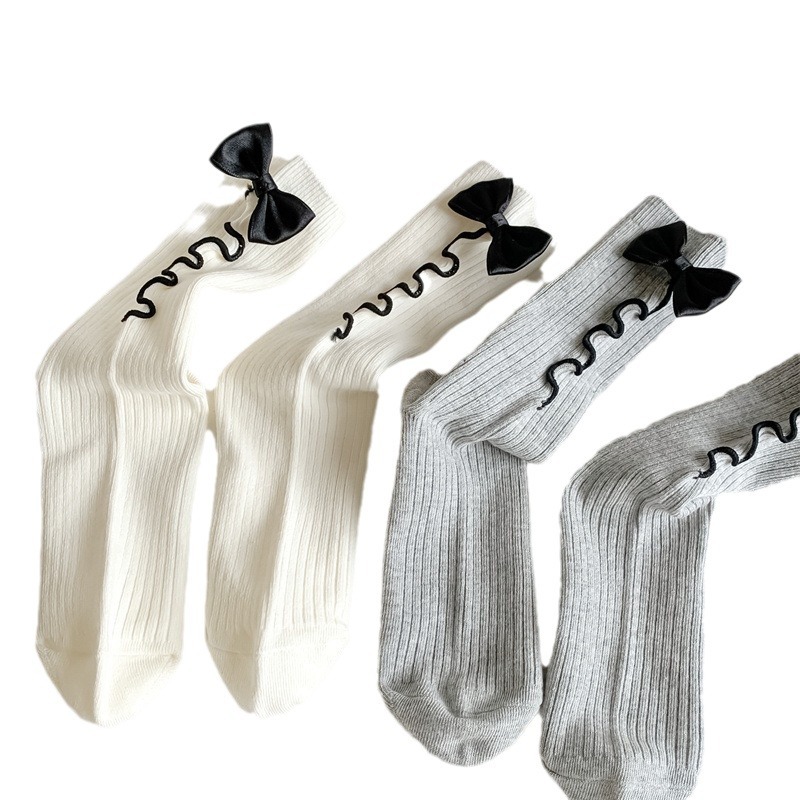 Dui Dui Socks Women's cotton mid-calf socks Autumn New style ins Trendy Ballet style Front black ear edge Bow socks wholesale Item Picture