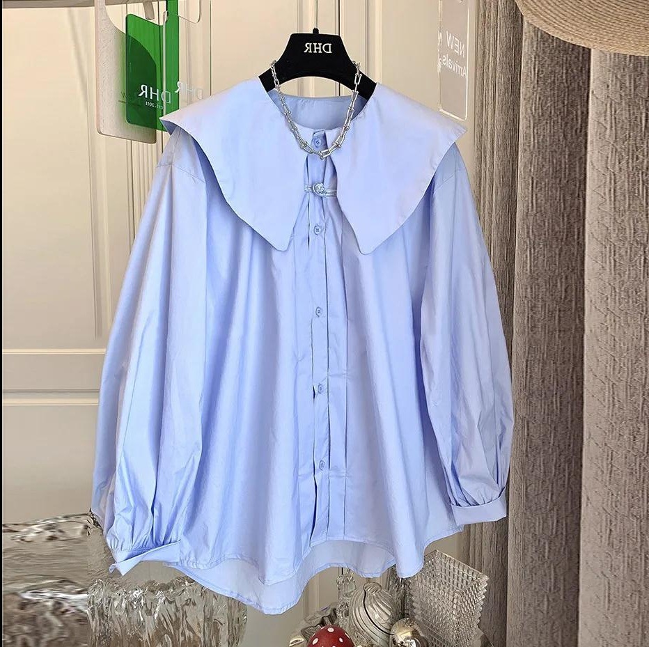 New Chinese-style, button-up, doll-collar, puffed-sleeve long-sleeved shirt for women, with a unique design sense and a 2022 spring trend