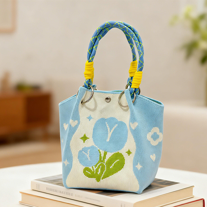 Factory direct sales cross-border new flower-knitted bucket bag as a souvenir gift bag, eco-friendly hand-held knitted bag for teachers, bucket bag for street vending, retail and wholesale, popular student small bag, fresh and artistic style, versatile crossbody bag for girls Specification image