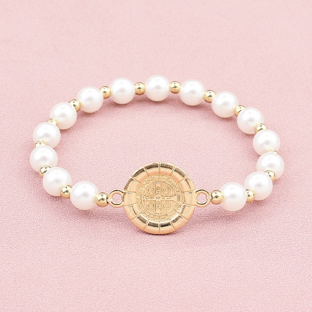 European And American Foreign Trade Amazon Express Temu Selling Saint Benedict Bracelet Saint Benedict Ladies Pearl Elastic Bracelet Couple Gift Manufacturers Wholesale Application Scenario