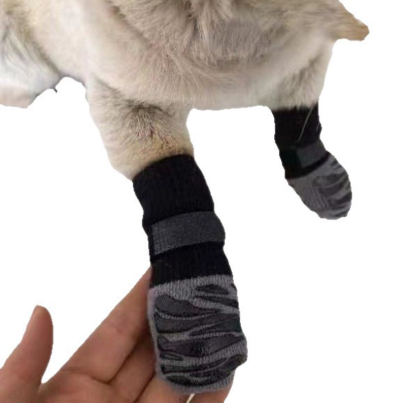 Factory direct sales of dog foot socks made of nylon material, suitable for wearing all year round Item Picture