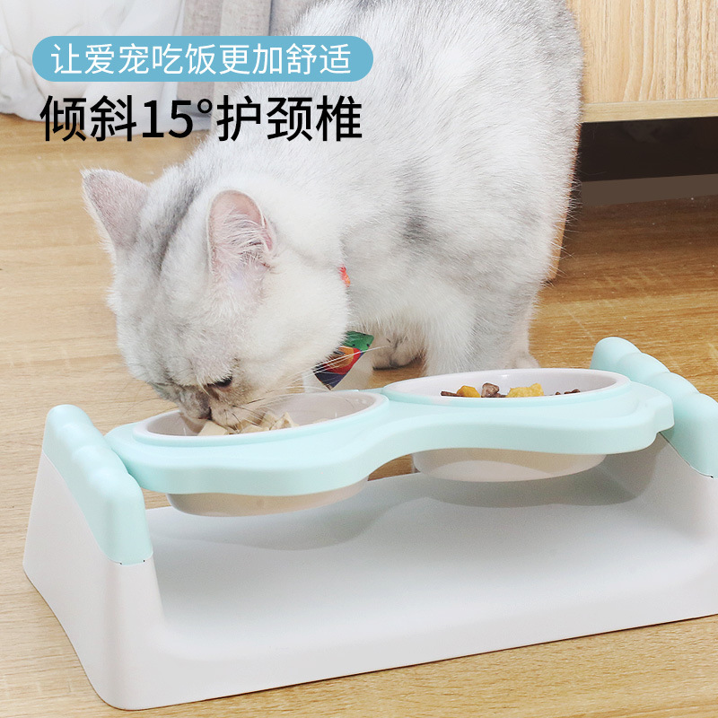 Pet tazón doble ángulo ajustable protector vértebra cervical cat bowl anti-capotaje tazón de perro de gran capacidad cat food bowl en stock al por mayor