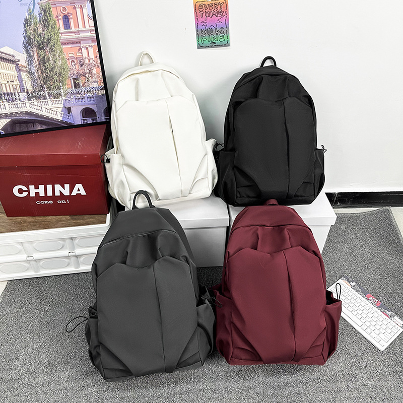 2024新款书包女大学生高中初中生旅行防水背包潮牌男大容量双肩包