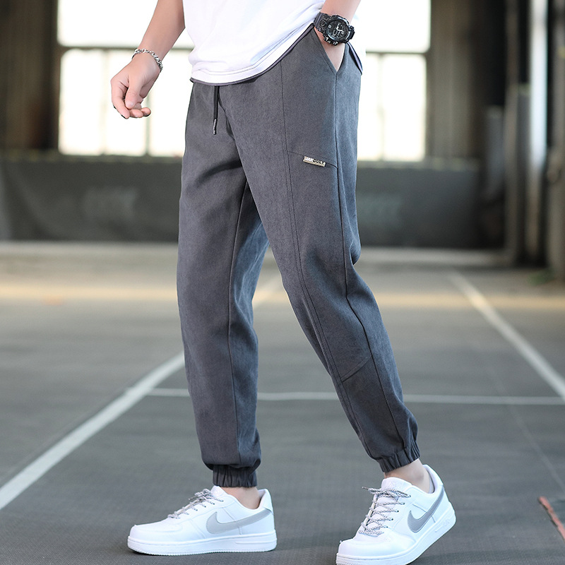 Men's Korean style tapered pants, one-piece consignment, loose youth sports pants, autumn new style casual pants for men details Picture