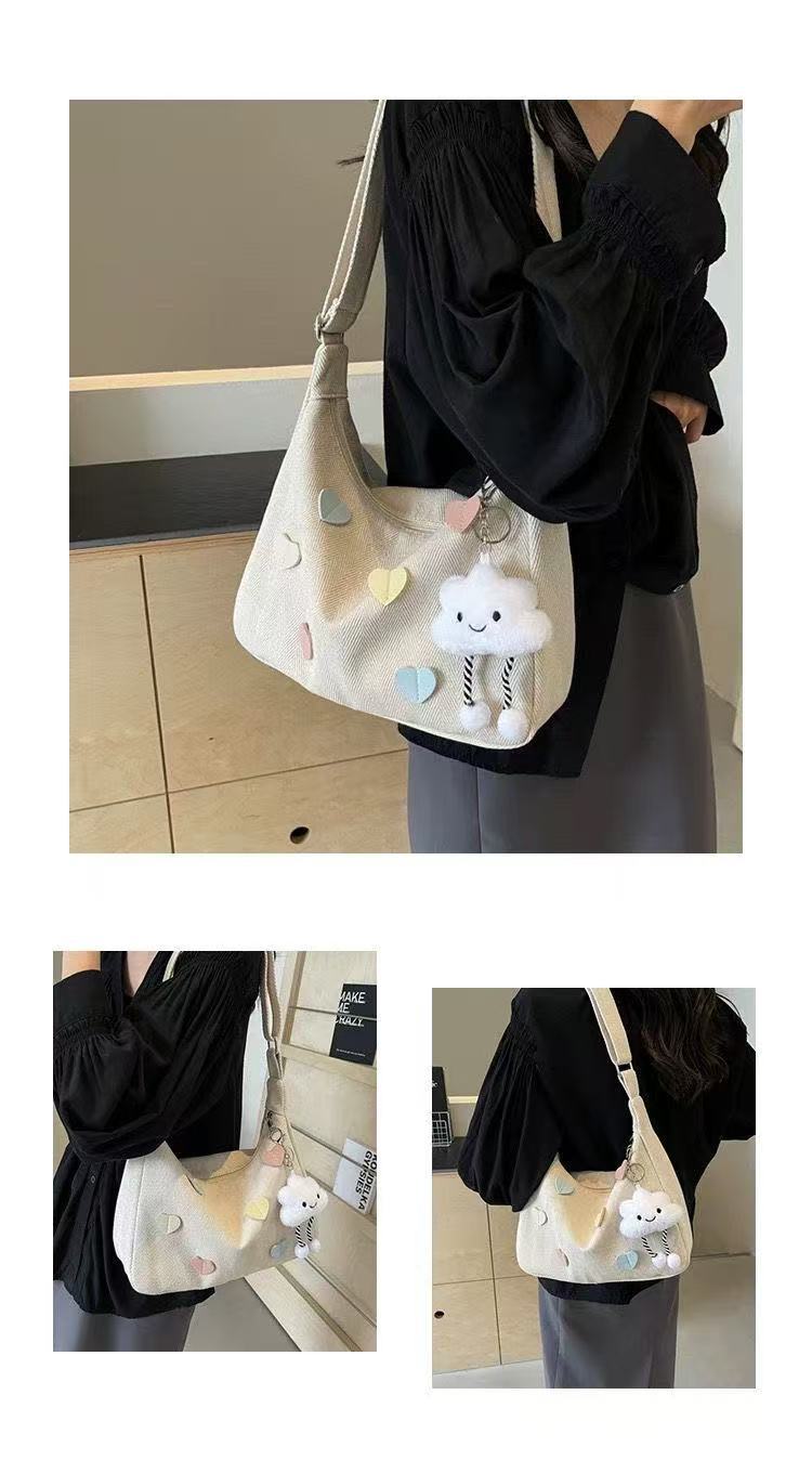 休闲帆布斜挎包女2025新款大学生上课潮牌小众百搭通勤单肩饺子包详情13