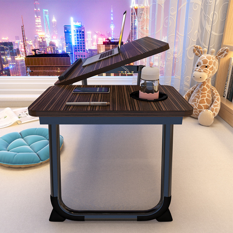 The small computer desk on the bed can be raised, lowered and folded. It is a home student writing desk for the bedroom and a lazy study desk for the dormitory Specification image