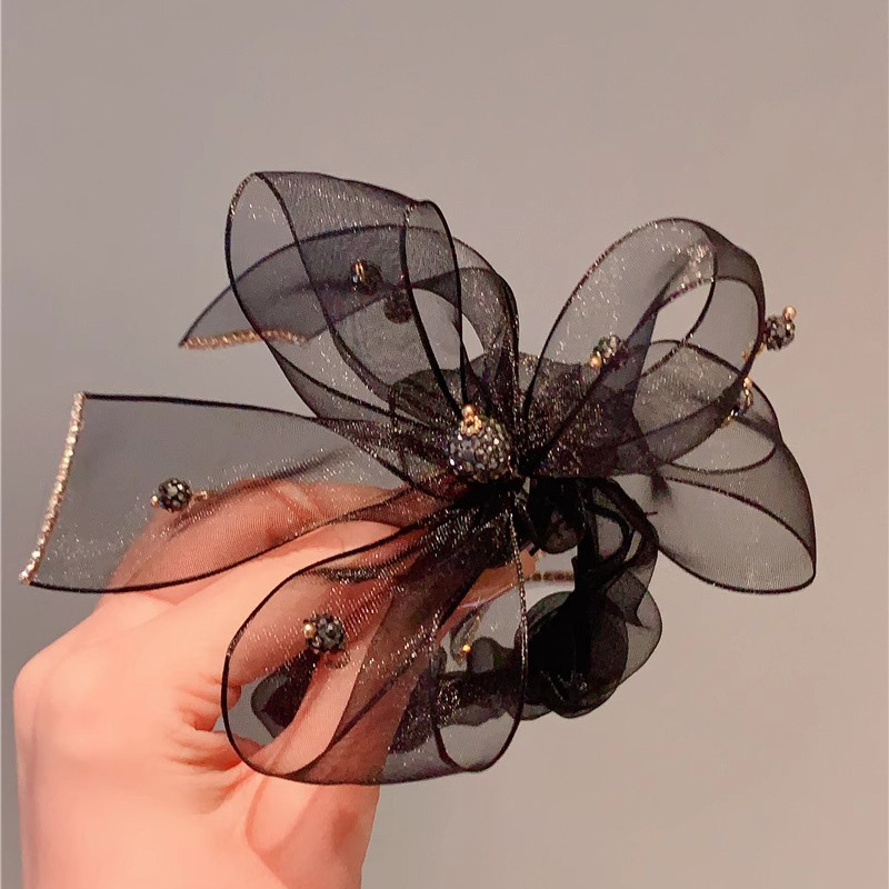 The new style of headwear in 2024, including hair ties, bows, hair bands and hairstyles, exudes a high-end feel. It's a hair tie for women and a large intestine hair band for women Application Scenario