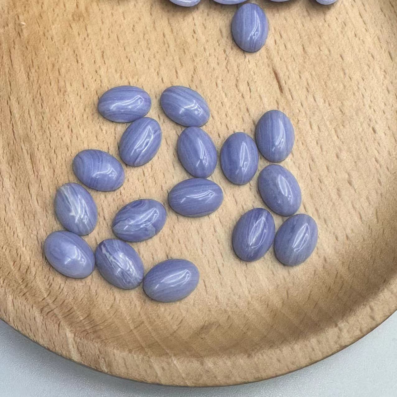 The manufacturer is selling a new type of synthetic purple agate Songdan shaped ring face, European and American fashionable crystal bare stone accessories wholesale loose beads details Picture