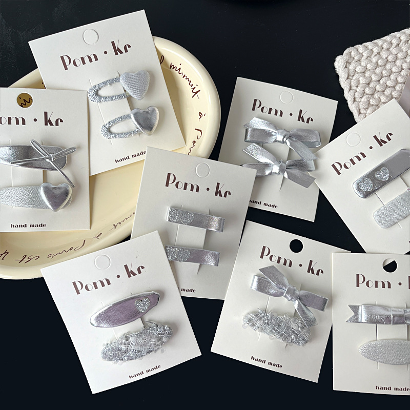 New Korean-style silver leather bow hair clips and hairpins, a high-end girl's versatile bangs hair accessory Specification image