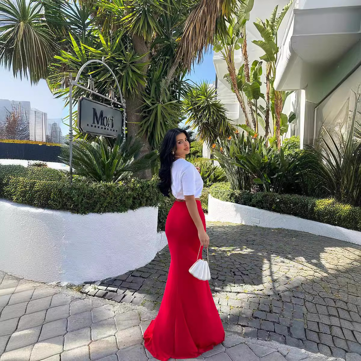 In the summer of 2025, a high-end, solid color, figure-hugging, three-dimensional floral slit, drape and flattering skirt from a European and American socialite Application Scenario