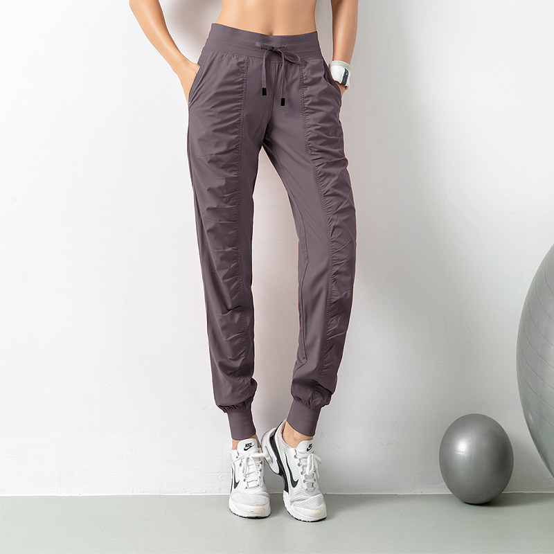Amazon's best-selling sports loose running yoga fitness quick-drying pocket casual 9-point women's tapered pants Application Scenario