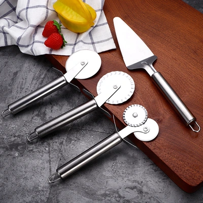 Kitchen gadgets: Cheesecake spatula, stainless steel baking tools, double-wheel pizza knife, roller knife thumbnail