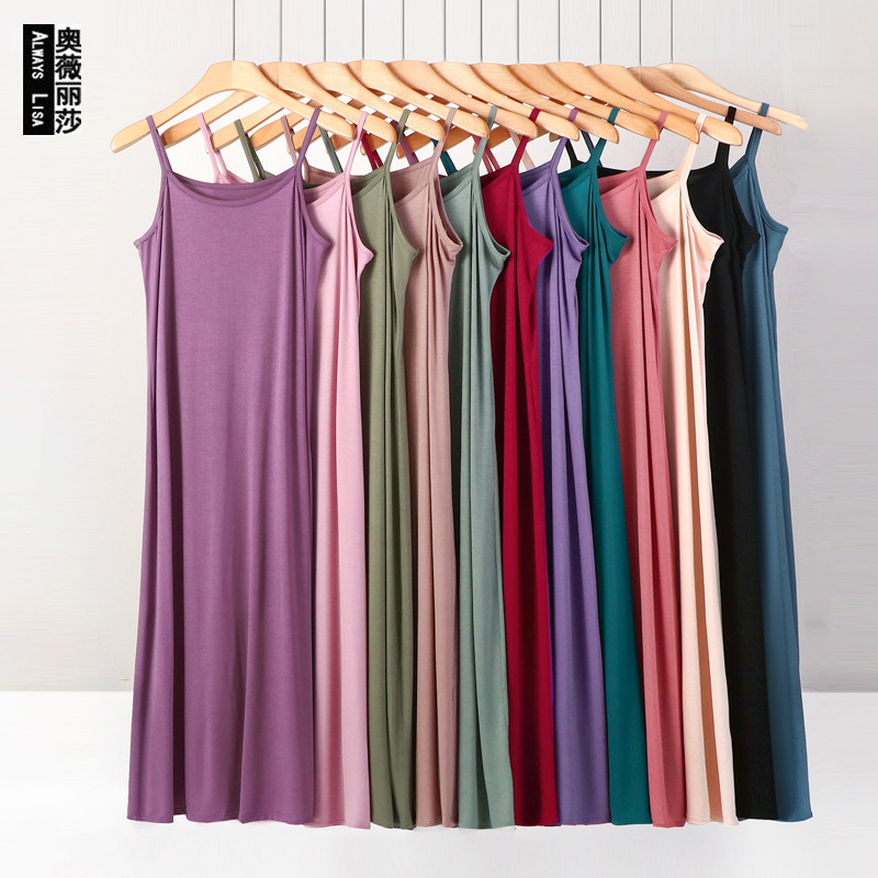 A plus-size, form-fitting long dress for spring and summer, paired with a nightgown and strappy modal cotton solid color base dress for women