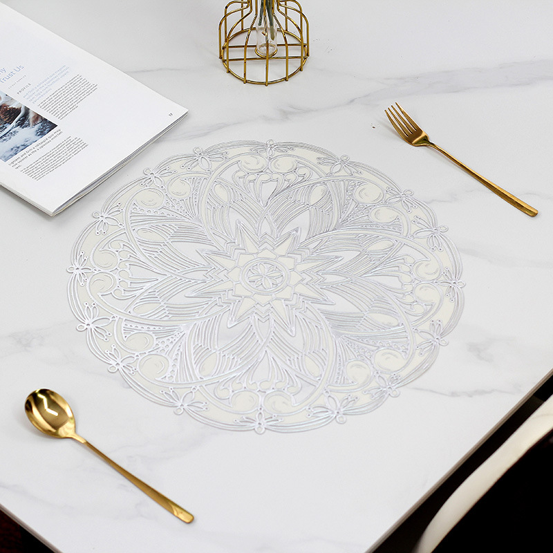 Womei European modern light luxury simple and elegant high-end flower-shaped hollowed-out table mat French retro geometric totem PVC waterproof, oil-proof, anti-slip and heat-insulating table mat details Picture
