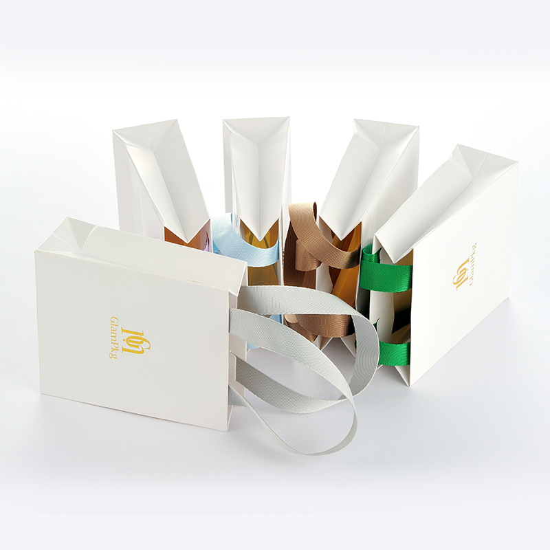 The cross-border bestseller white hand-held paper bag jewelry packaging has been replaced with a ribbon bow, a commercial small gift bag with a high appearance level details Picture