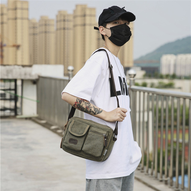 韩版新款男女单肩包潮搭帆布包简约大气斜跨包商务通勤时尚休闲包图