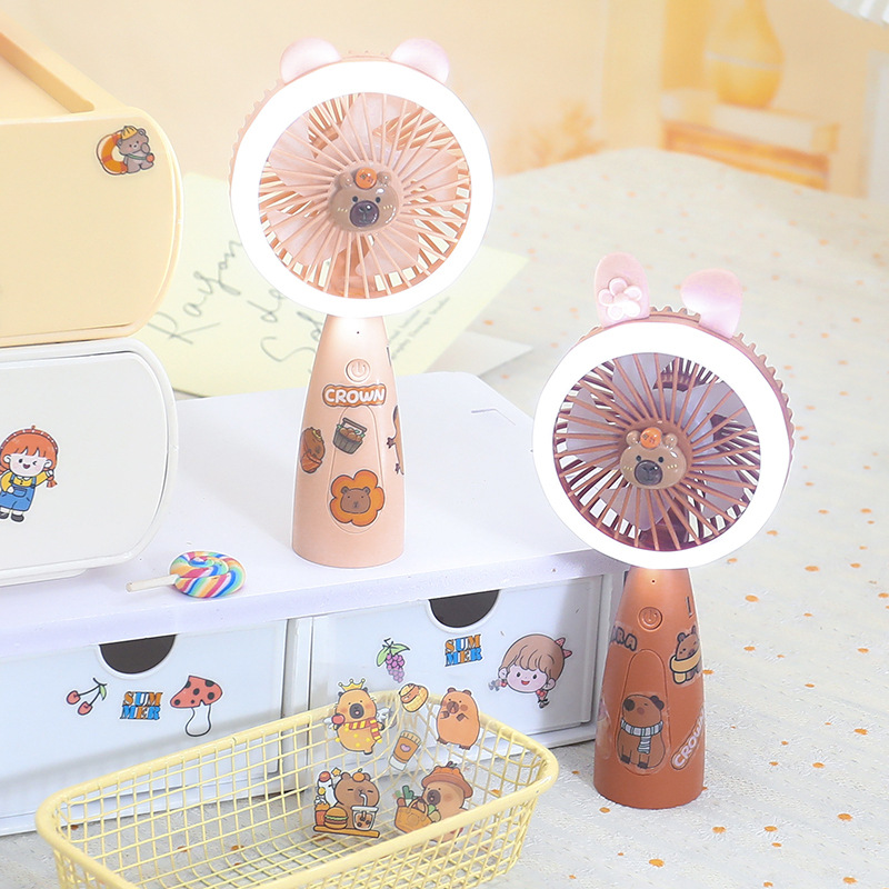 New three-speed strong wind power cartoon sticker handheld fan, student portable charging LED light desktop small fan details Picture