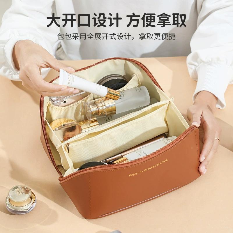 Portable makeup bag for going out, large-capacity skin care products, pillow bag design, travel toiletries, cosmetics, ins storage bag pic 1