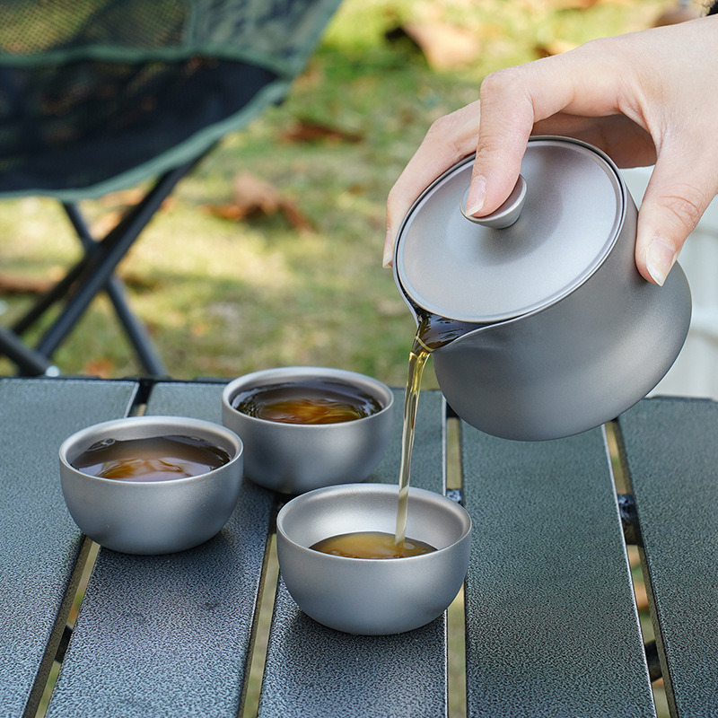 Pure titanium Chinese-style travel kung fu tea set, high-end double-layer quick guest cups, one pot and three cups portable package for outdoor use Specification image