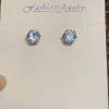 A popular six-prong copper zircon white 8MM zircon stud in Europe and America, a stylish and versatile light luxury fashion style, available for wholesale from the manufacturer details Picture