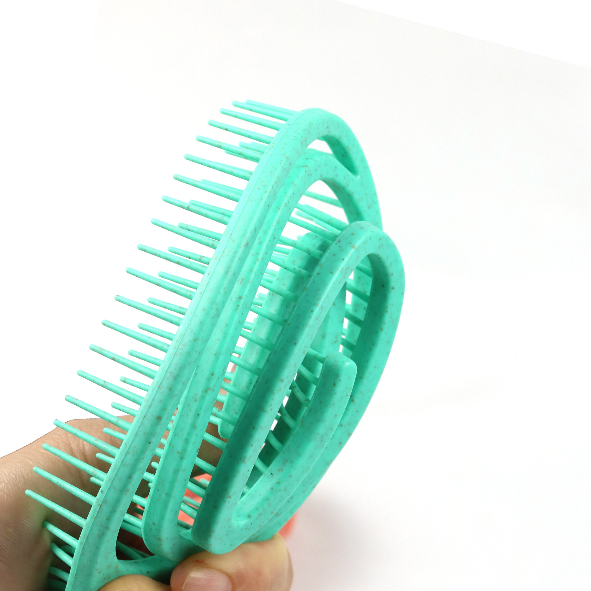 New wheat straw hollowed-out circular comb, elliptical arc-shaped elastic mosquito repellent comb, massage ribs shaped hair comb Specification image