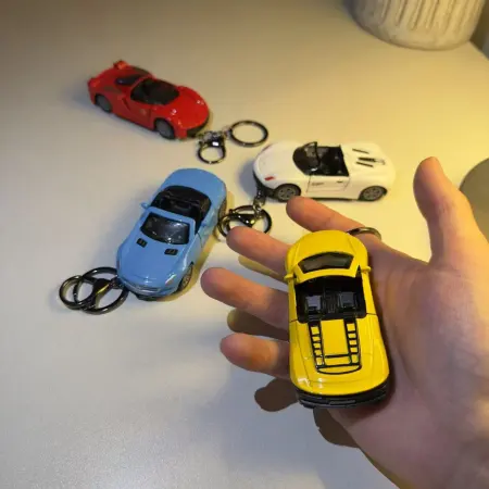 Combination alloy sports car, rebound car model, keychain, bicycle pendant, creative motorcycle bag, key chain Combination alloy sports car, rebound car model, keychain, bicycle pendant, creative motorcycle bag, key chain