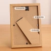 Wholesale of photo frames, 6-inch photo frame display stands, decorative items, photo walls, 7-inch and 8-inch a4 creative, simple, arc-shaped wooden puzzle frames Application Scenario