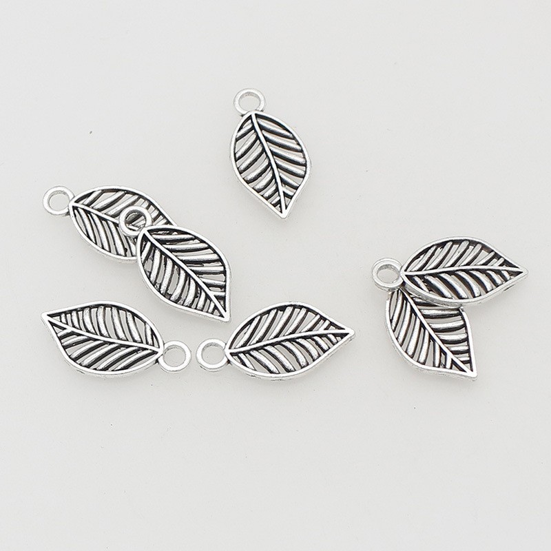 Retro hollowed-out alloy leaf pendants, woven rope bracelets, earrings, hidden silver pendants, hanging ornaments, DIY jewelry accessories Application Scenario