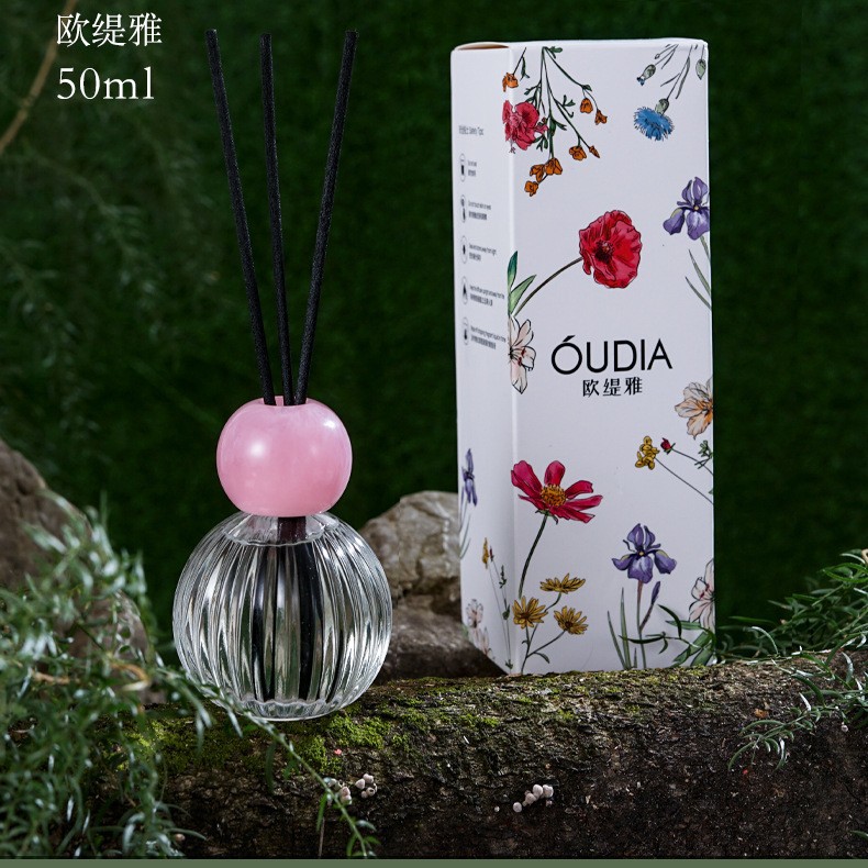 Wholesale Otia plant essential oil fragrance with colorful LIDS for home indoor bathroom deodorizing aromatherapy. It doesn't cause irritation even after long-term inhalation details Picture