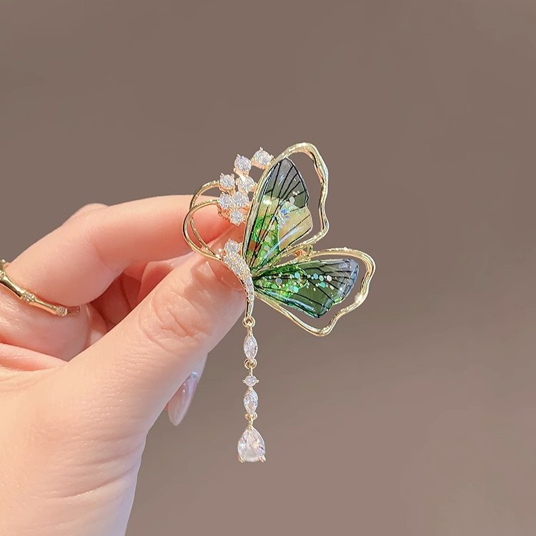 A High-End Emerald Brooch In 