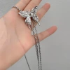 A high-end, pull-out silver butterfly tassel necklace for women, a light luxury and niche design, fashionable and elegant, versatile collarbone chain Specification image