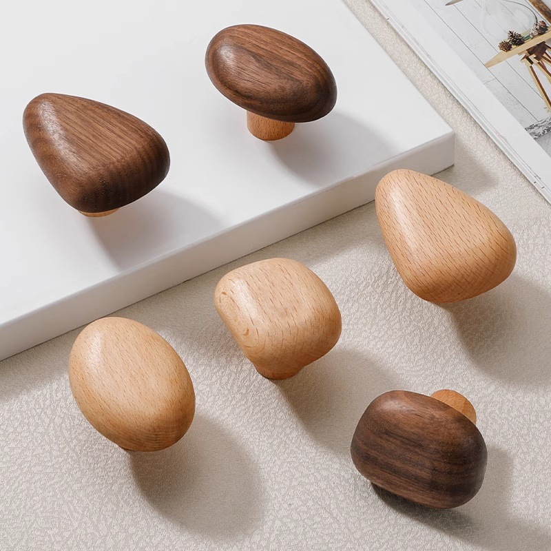 The Nordic solid wood bedroom cabinet is warm and cute. The cabinet door handles are creative and adorable. The cabinet door drawer handles are in the shape of pebbles