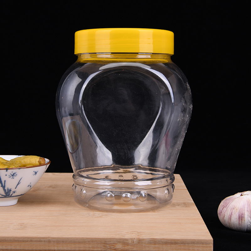 Manufacturer's 1-pound transparent plastic jar with lid, wide-mouth snack bottle, food kitchen sealed jar, pet storage jar details Picture