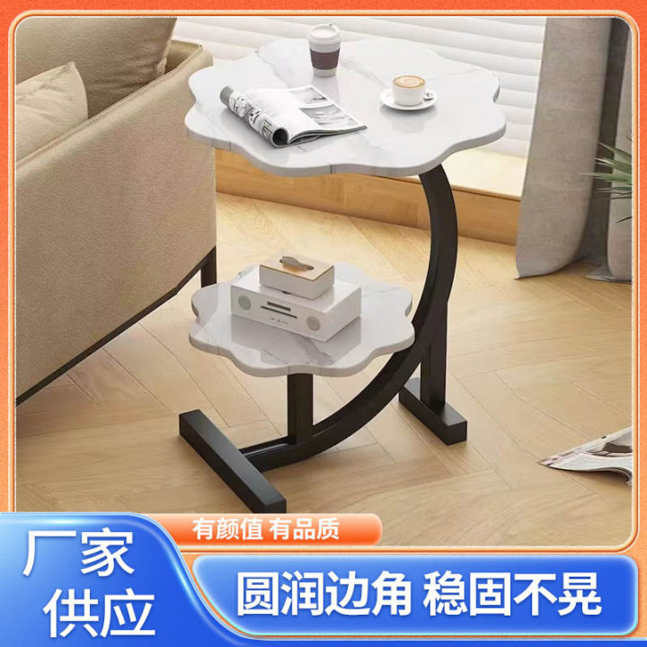 Table beside the sofa