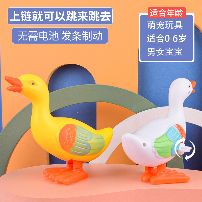 Street stall wholesale of wind-up toys, jumping big yellow duck simulation animals, cute babies, educational crawling boys and girls details Picture