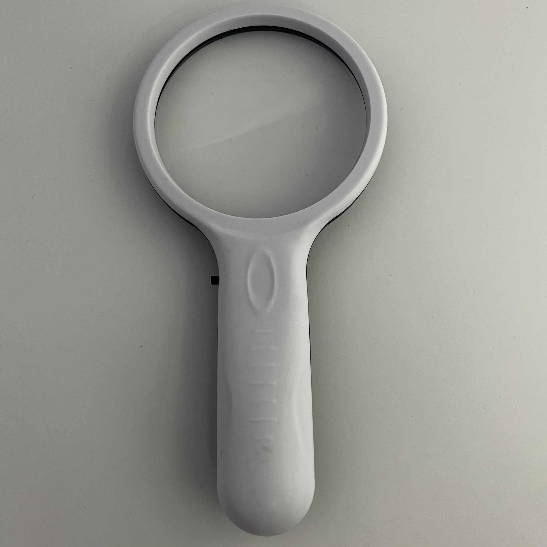 New large-sized 90mm handheld high-definition high-magnification magnifying glass with 2 LED lights, gift magnifying glass with lights Item Picture