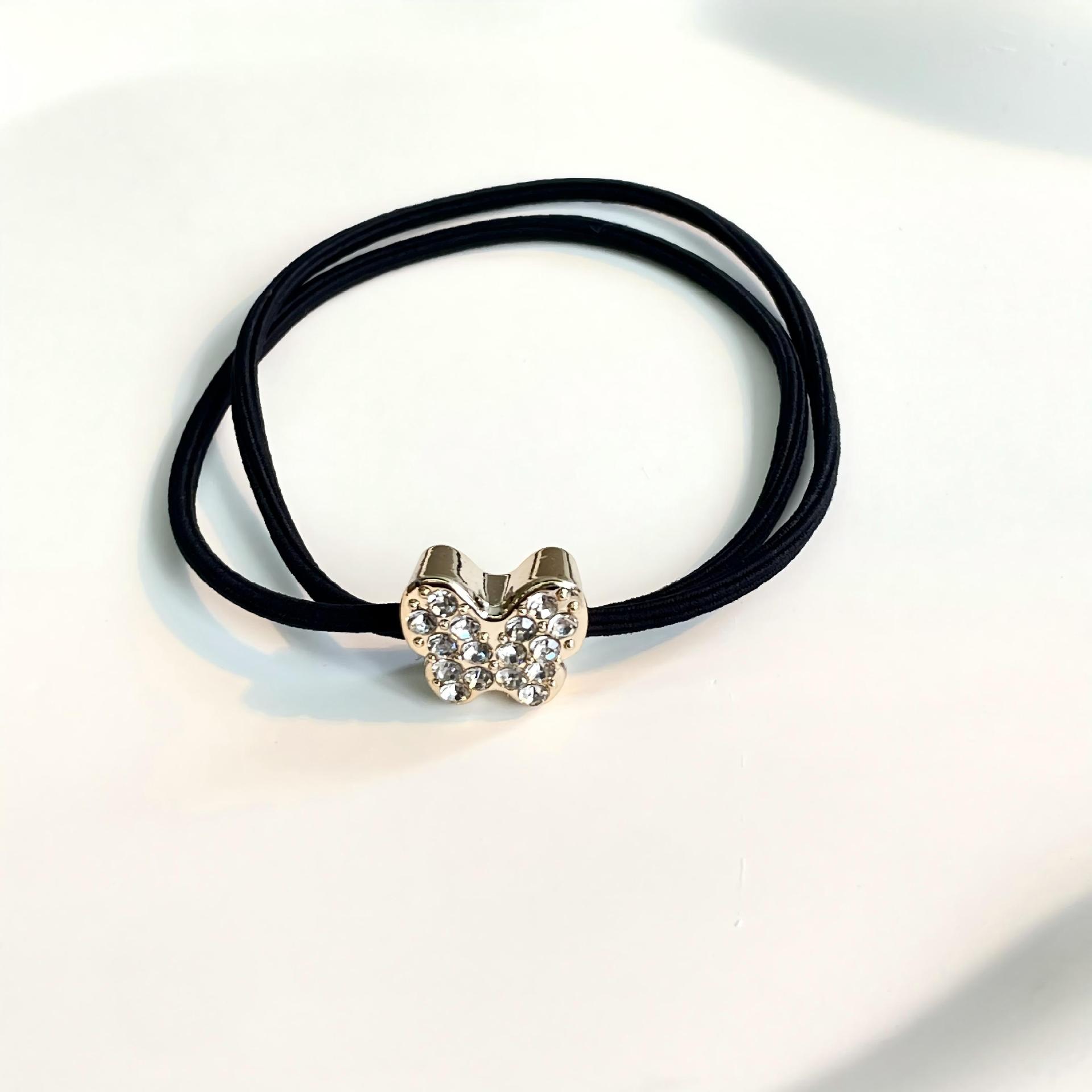 The new five-pointed star bow hair tie has a cold style, a simple metal hair band, and a delicate leather band for tying hair, exuding a sense of luxury details Picture