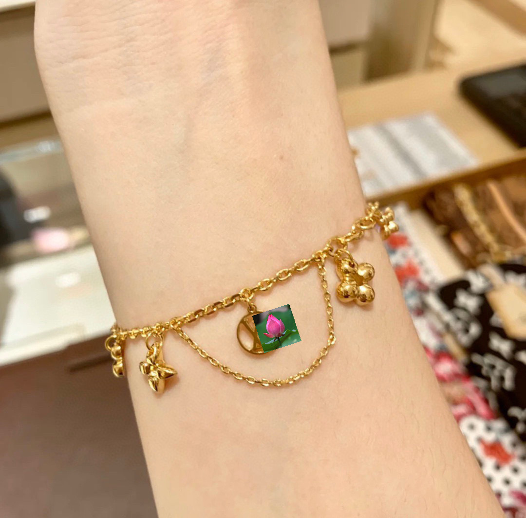 钥匙扣/耳饰女长款时尚/佛祖头像项链/饰品白底实物图