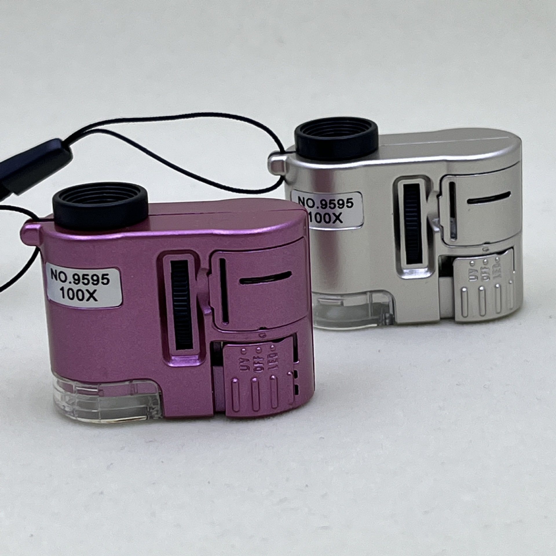 新款100倍光学 显微镜玉石字画鉴定便携迷你型带LED紫光灯显微镜