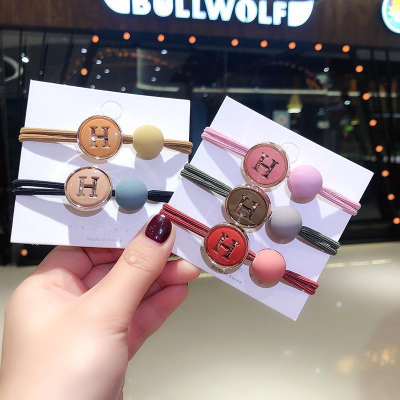 Korean-style simple headwear, creative H-bean jelly color rubber band, fashionable and versatile women's hair band, wholesale price from boutique Application Scenario