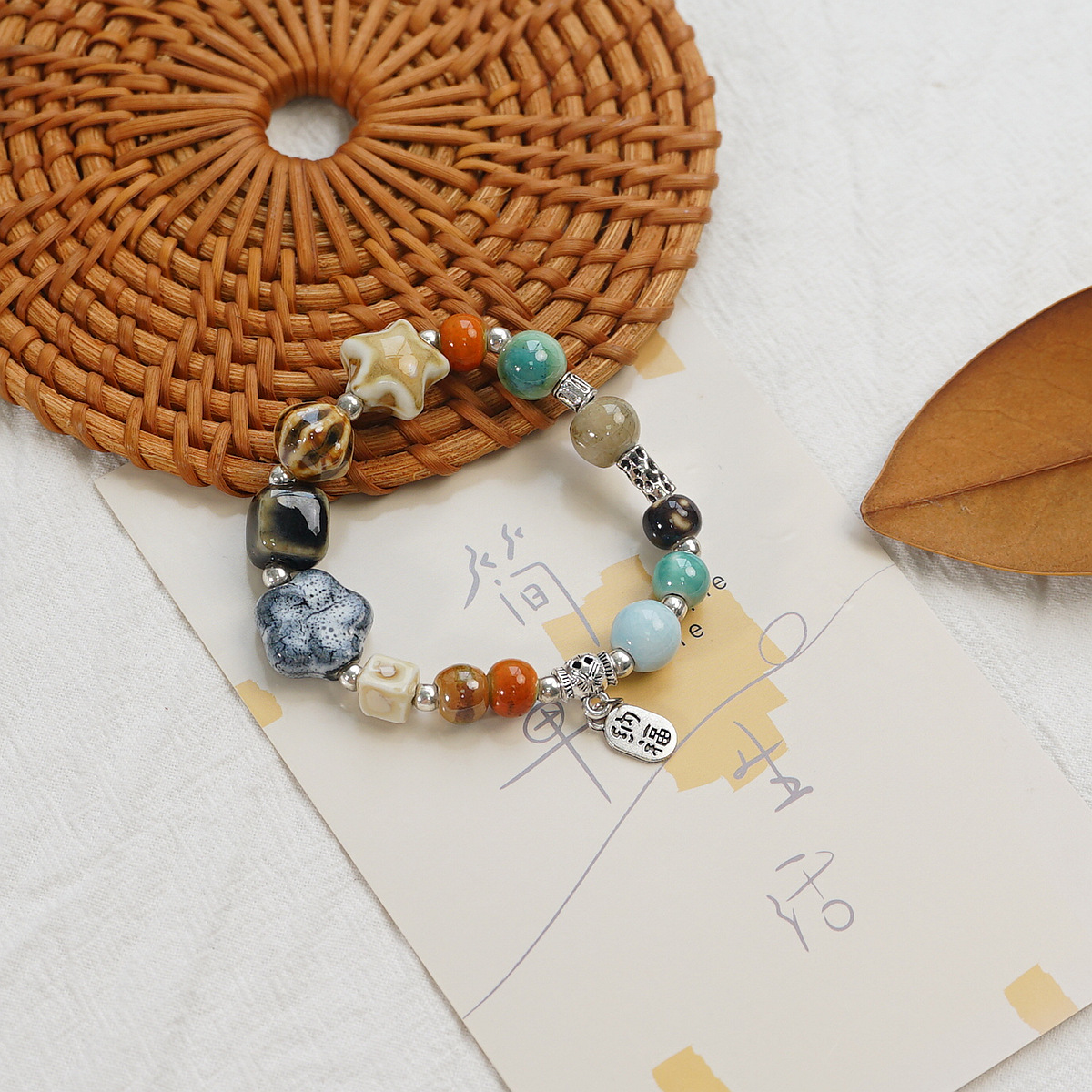 A new Chinese-style single-loop Jingdezhen ceramic bracelet, a touch of celadon ethnic style artistic butterfly fashion bracelet accessory Application Scenario