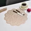Cross-border wholesale of Nordic-style waterproof and heat-insulating table MATS, PVC gold-embossed table MATS, and creative hollowed-out circular floral placemats details Picture