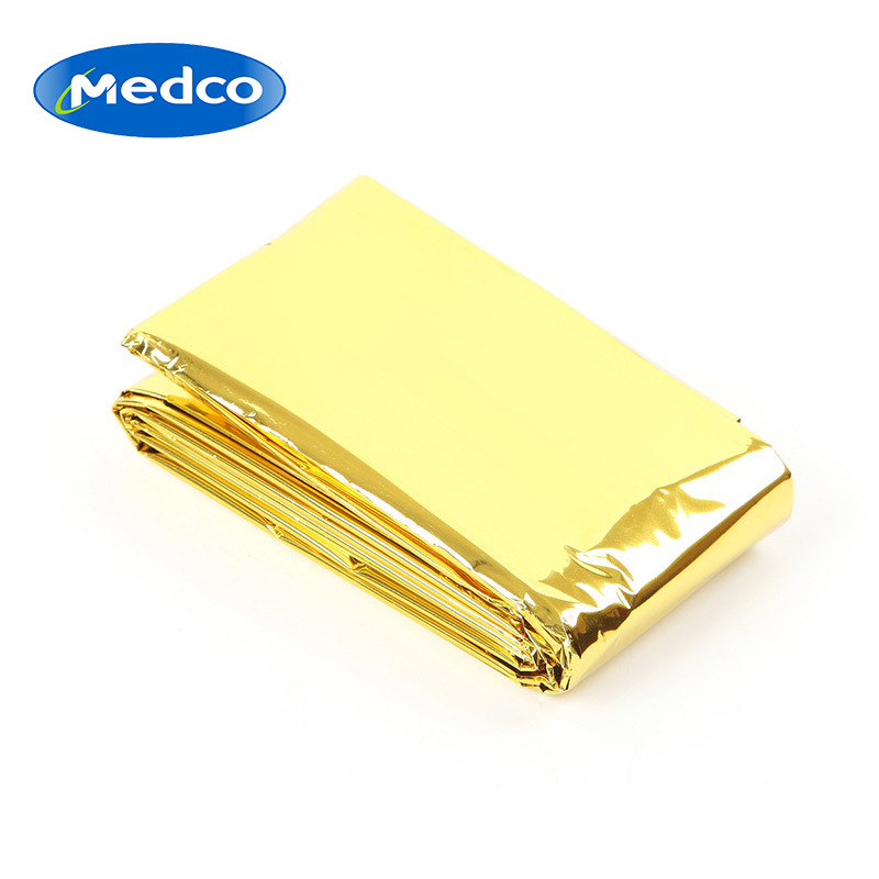 跨境专供户外便携式PET金色急救毯多功能户外防晒保暖野外救生毯