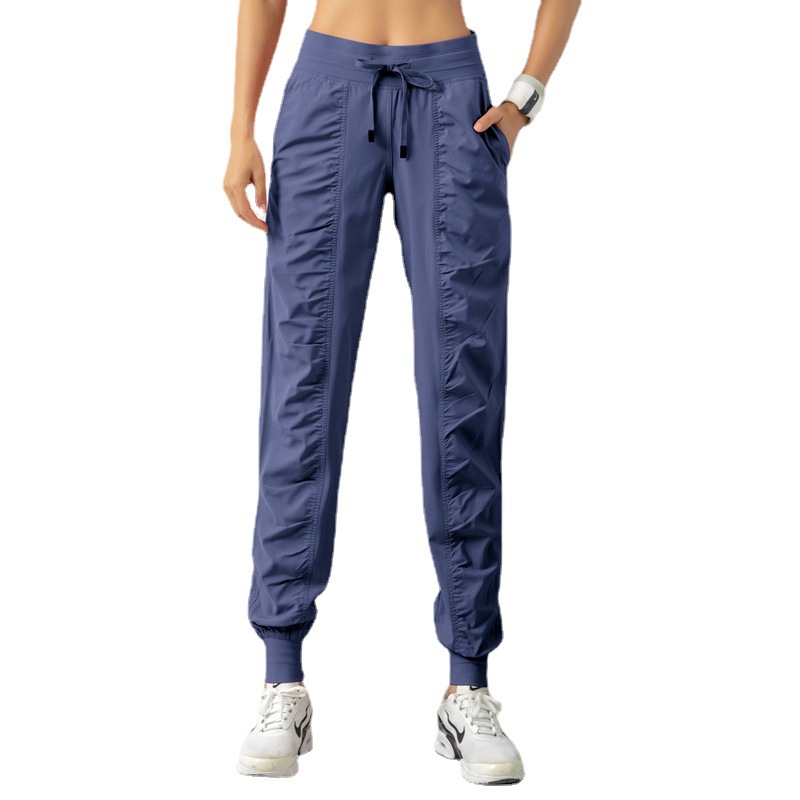 Amazon's best-selling sports loose running yoga fitness quick-drying pocket casual 9-point women's tapered pants Item Picture