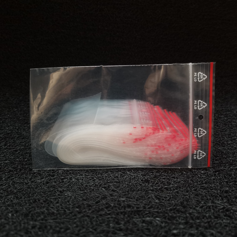 打孔密封袋8*14cm透明袋封口上印刷白色环保回收标志PE LD自封袋